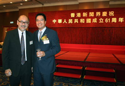 Mr. Kit Szeto with Mr. Michael Wong, Director of the Information Services Department of the HKSAR.