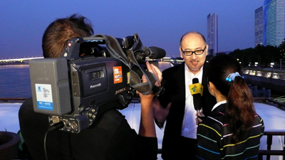 Mr. Kit Szeto being interviewed by Guangdong Television’s Sports Channel onboard the leisure cruiser, the Guangdong TV.