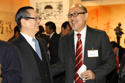 	The opening ceremony is attended by many of Hong Kong's political and business leaders. Mr. Kit Szeto (left) is pictured here speaking with Mr. Robin Chan Yau Hing, member of the National People's Congress Standing Committee.