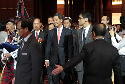 Mr. C.Y. Leung entering the banquet hall accompanied by Mr. Sein Aye Pierre, President of The Mirror.  