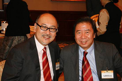 Mr. Kit Szeto with Mr. Peter Pao, Director of Wharf Holdings, at the welcome banquet for mainland guests