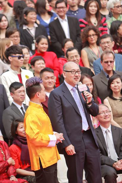 Mr. Kit Szeto sending warm wishes to one and all in his speech.
Photo Caption: The suckling pig cutting ceremony is marked by high spirits all around.