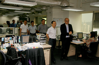 Mr. Kit Szeto introducing Mr. Huang’s party to Dim Sum TV’s operations.