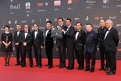 Director Derek Yee Tung-sing (middle), chairman of the Hong Kong Film Awards Association, along with other committee members, (from left) Ms. June Wong, Mr. Man Chun-wing, Mr. Cyrus Ho Kim-hung, Mr. Chow Kwok-chung, Mr. Chin Ka-lok, Mr. Simon Yam Tat-wah, Mr. Tenky Tin Kai-man, Mr. Manfred Wong, Mr. Keung Kwok-man and Mr. Percy Fung Tze-cheong, raised the curtains for this year’s Hong Kong Film Awards.