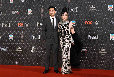 Ms. Petrina Fung Bo-bo (right) arrived on the red carpet with her son (left) from Beijing. 