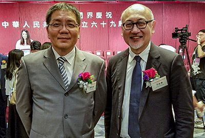 Photo of Mr. Kit Szeto and Mr. Leung Ka-wing, Director of Broadcasting of the HKSAR